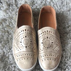 Gold sneakers! Size 9. Worn twice.